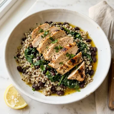 Easy clean high-protein meal with baked chicken, quinoa, spinach, and black beans