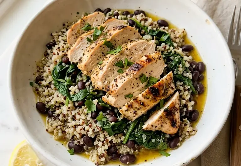 Easy clean high-protein meal with baked chicken, quinoa, spinach, and black beans