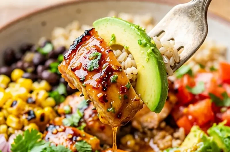 Pinterest pin image for vibrant Honey Lime Chicken & Avocado Rice Bowl with fork lift