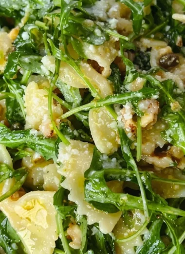 Close-up of Lemon Arugula Pasta Salad freshly made and ready to serve