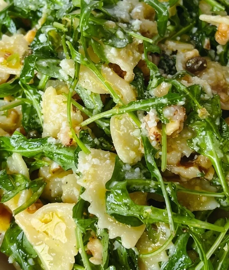 Close-up of Lemon Arugula Pasta Salad freshly made and ready to serve