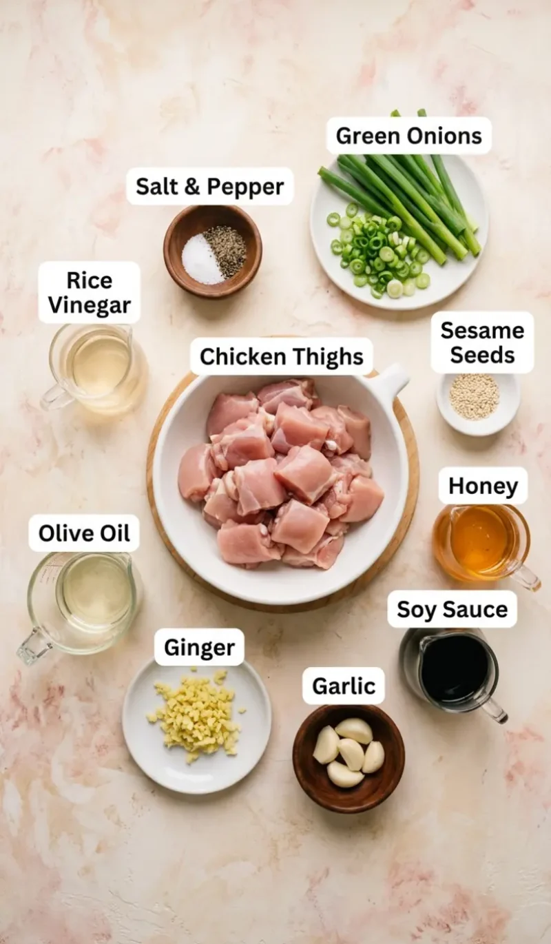 Labelled overhead flatlay of all 10 ingredients for Honey Garlic Chicken Skewers on a cream and blush plaster surface, each ingredient named